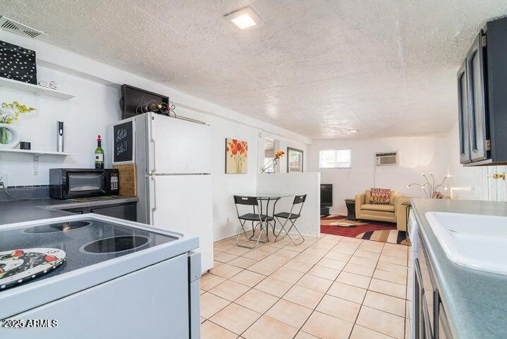 122 W WASHINGTON Avenue
