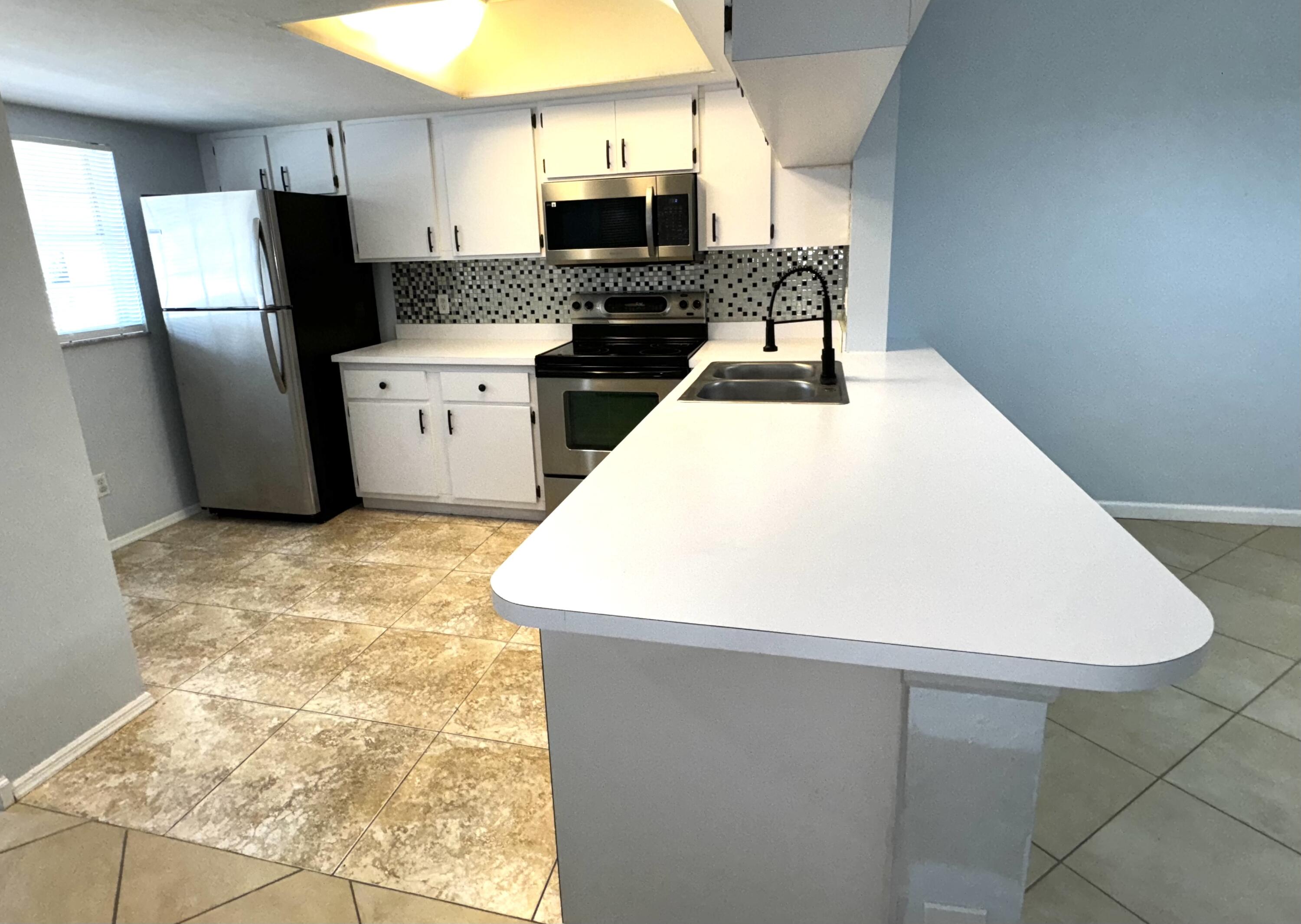 1702 Palm Beach Trace Drive