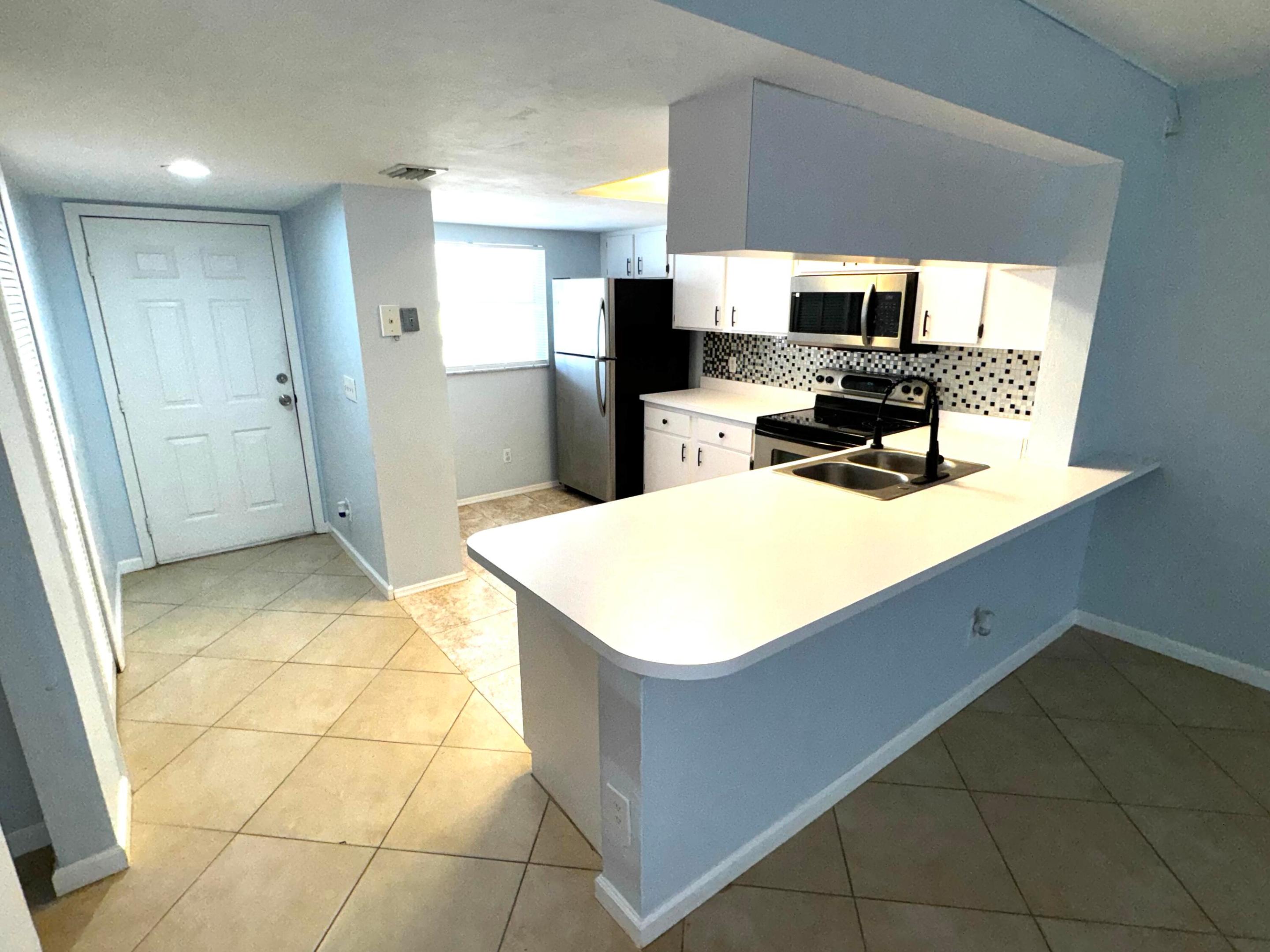 1702 Palm Beach Trace Drive