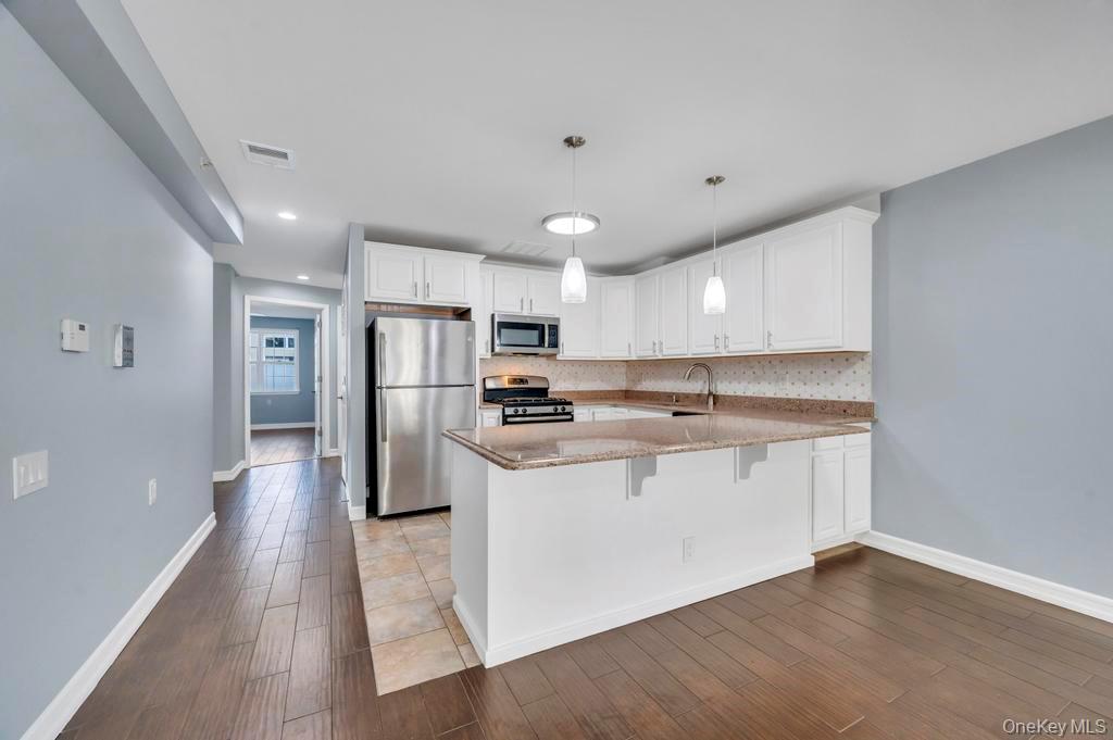 10220 Rockaway Beach Boulevard Unit: 1A