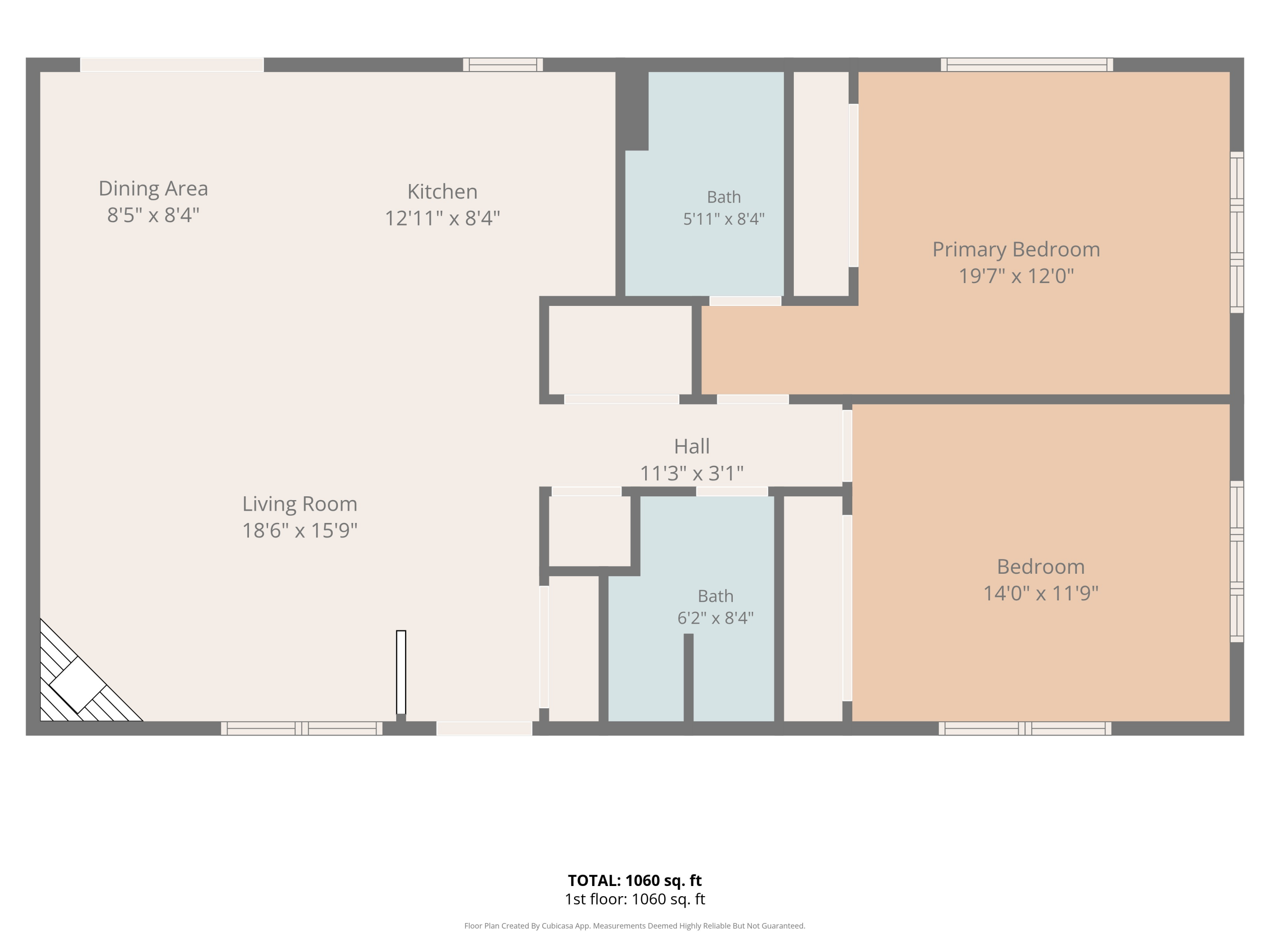 Floor plan showing a 1,060-square-foot home with two bedrooms, two bathrooms, and an open living, dining, and kitchen area.