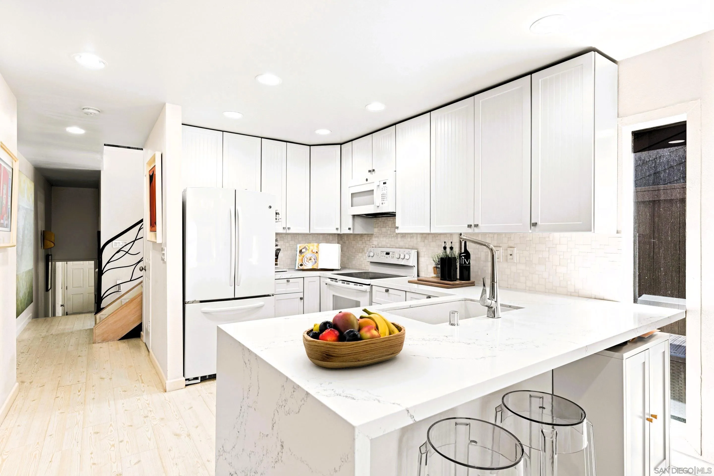 Remodeled kitchen with quartz countertops-at 194 Neptune Ave in Encinitas-CA-92024-Leucadia-featuring coastal design elements, and oceanfront ambiance in this luxury home listed by FW Property Group