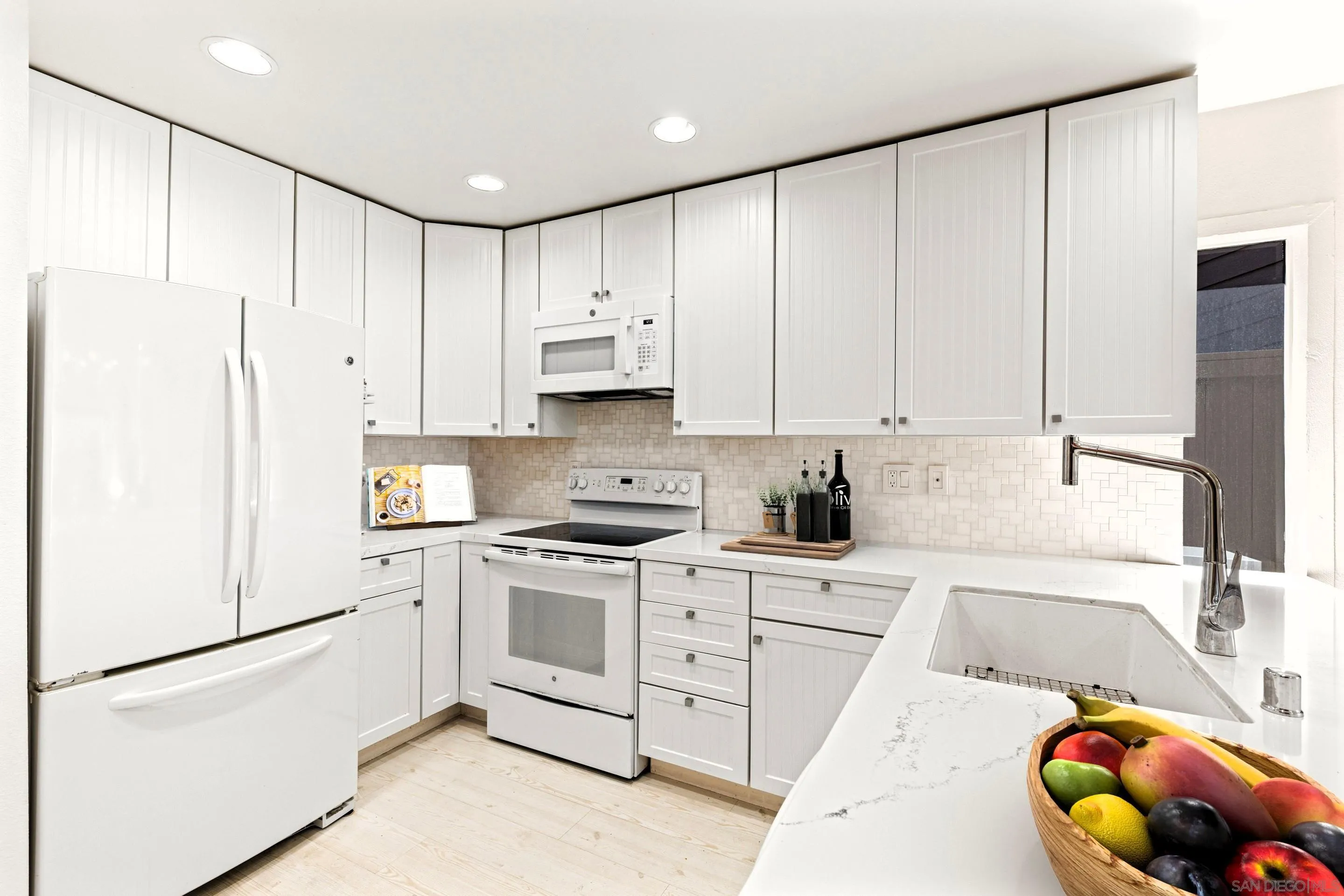 Remodeled kitchen with quartz countertops-at 194 Neptune Ave-Encinitas-CA-92024-Leucadia-featuring coastal design elements, and oceanfront ambiance in this luxury home listed by FW Property Group