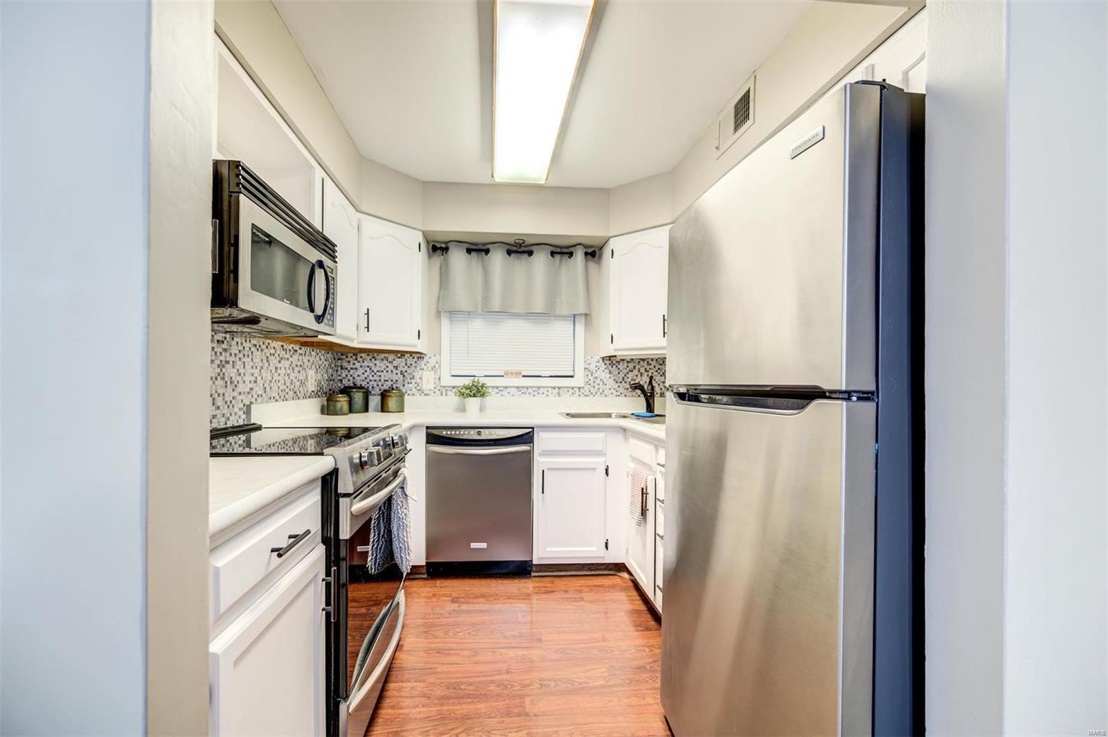 5121 Hollow Wood Court Unit: B