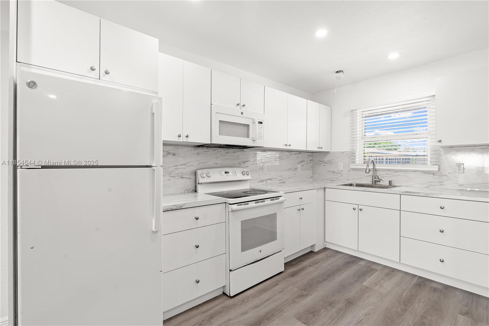 1400 NE 57th Ct # 302