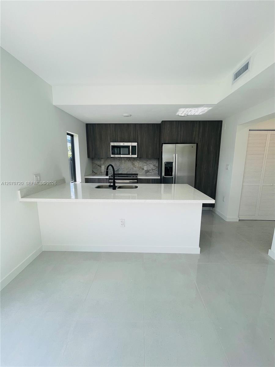 209 NW 13th Pl