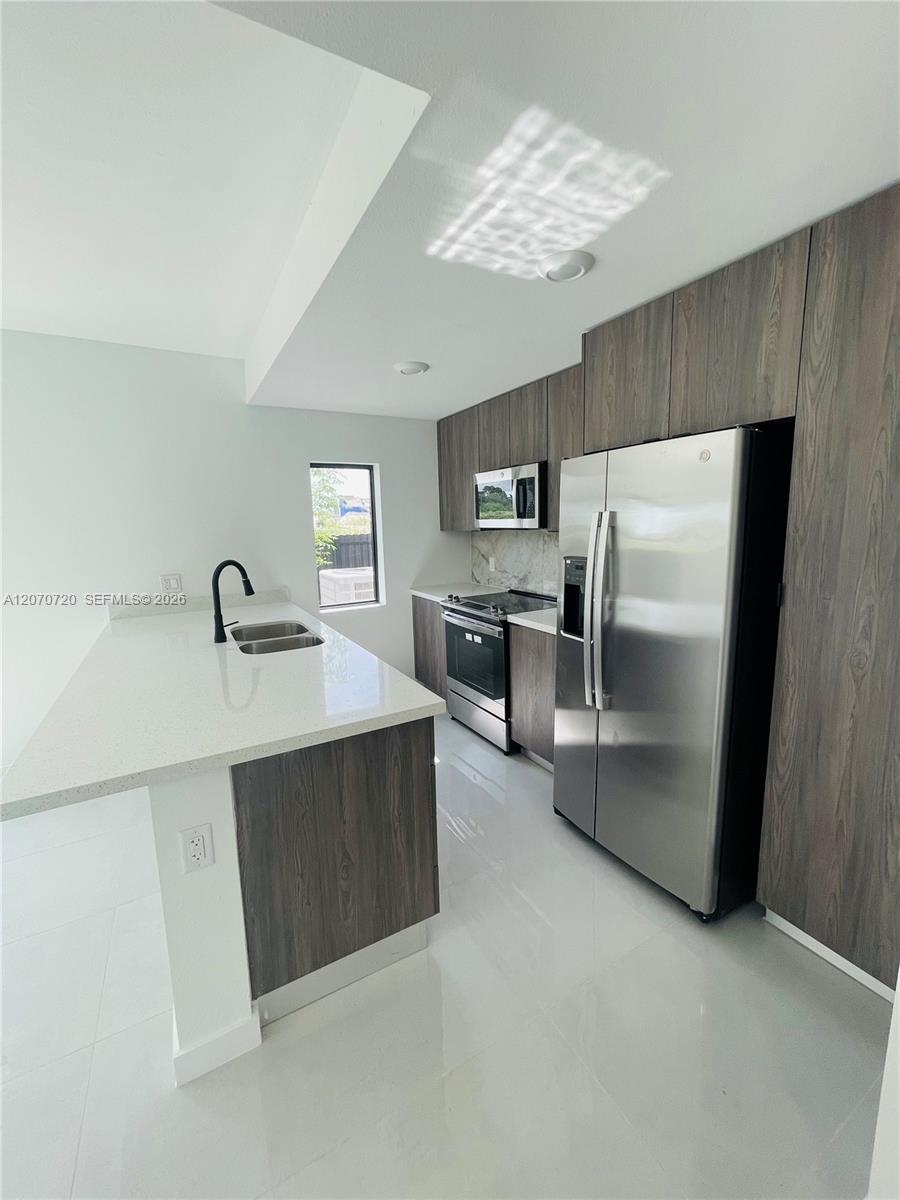 209 NW 13th Pl