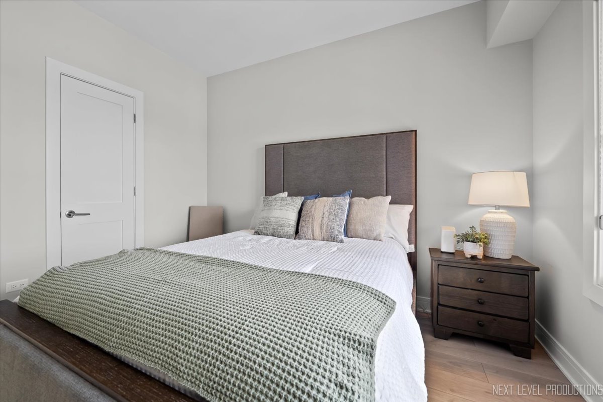 100 N River Lane Unit: 203