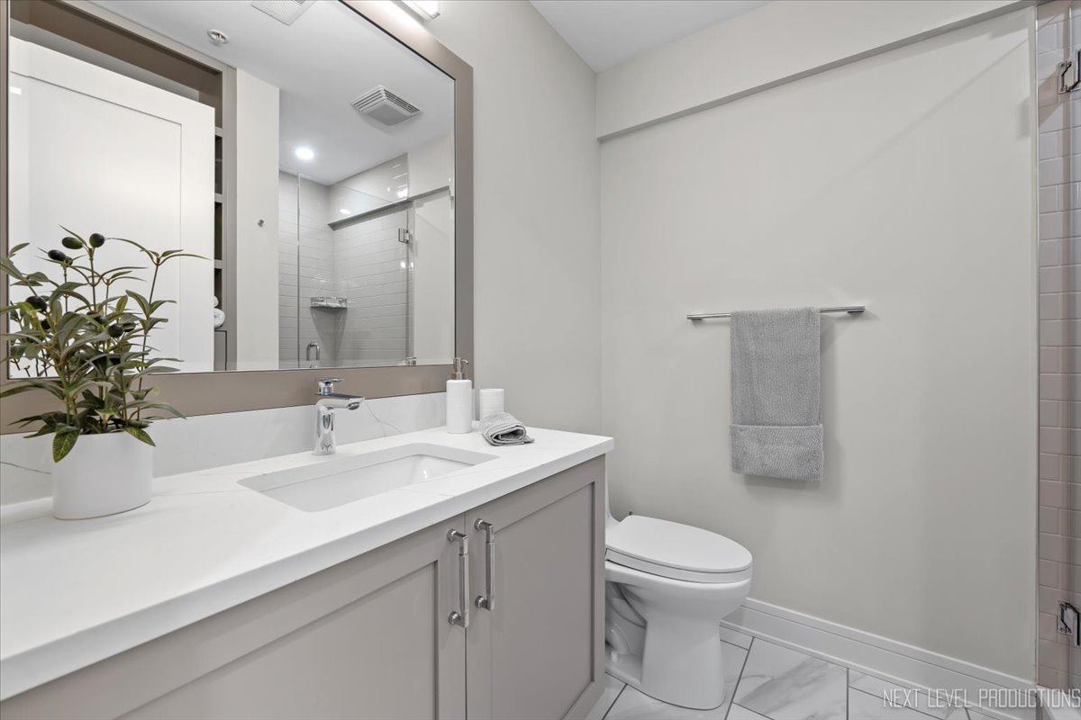 100 N River Lane Unit: 203