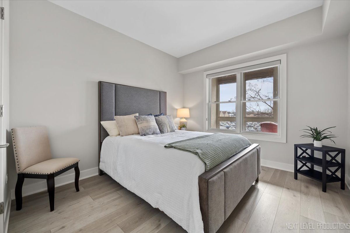 100 N River Lane Unit: 203