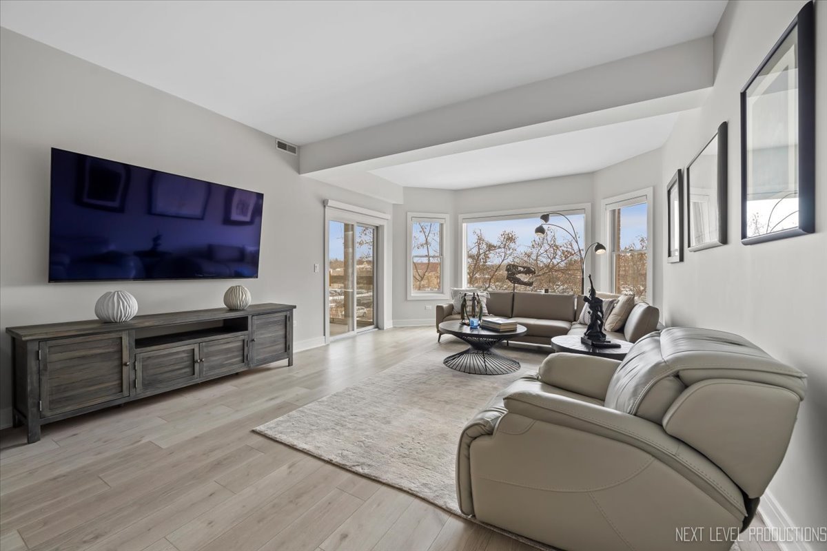 100 N River Lane Unit: 203