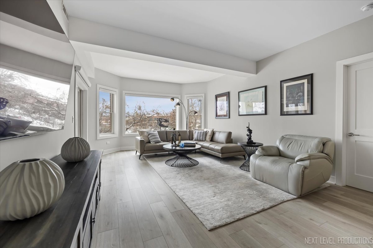 100 N River Lane Unit: 203