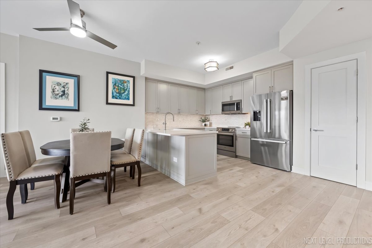 100 N River Lane Unit: 203