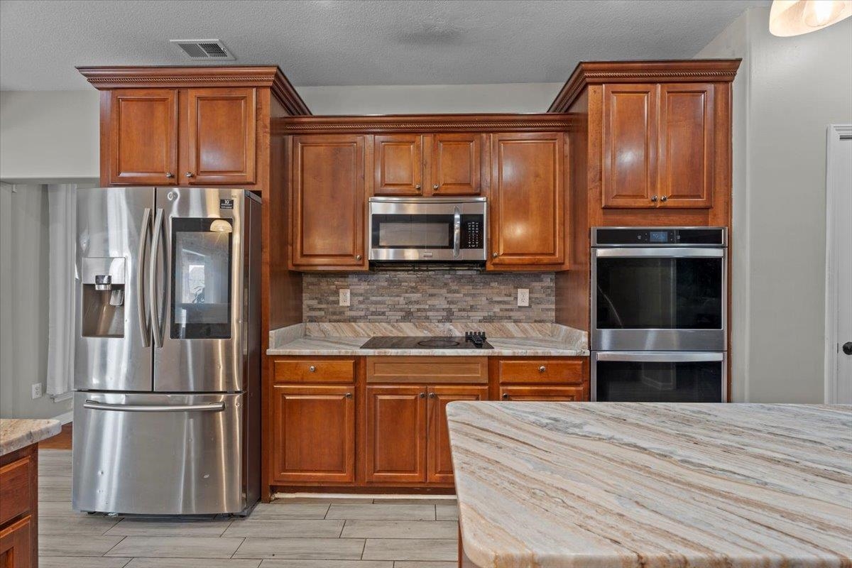 8051 LAUREL TREE CV