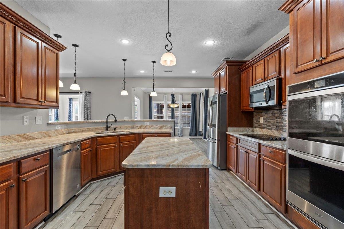 8051 LAUREL TREE CV