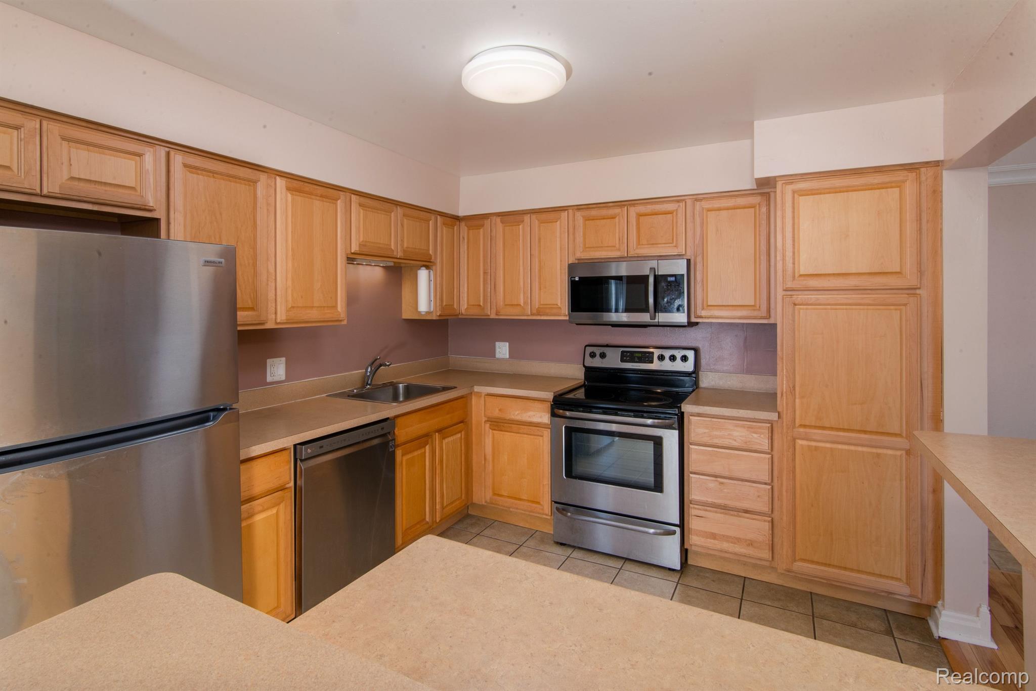 6115 ORCHARD LAKE RD 103
