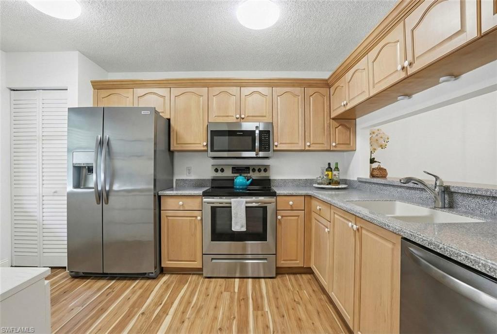 5654 WOODMERE LAKE CIR # C203