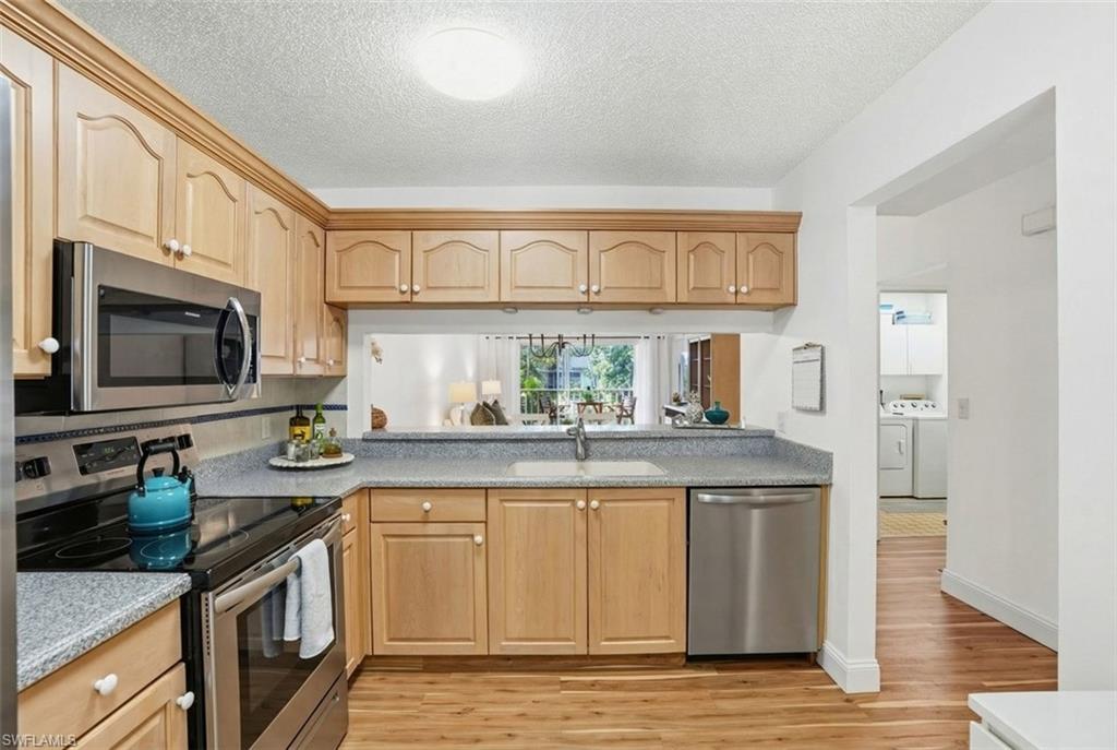 5654 WOODMERE LAKE CIR # C203