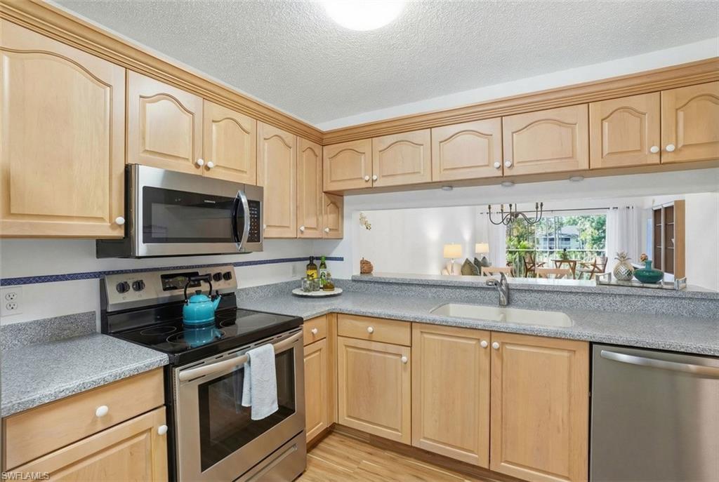 5654 WOODMERE LAKE CIR # C203