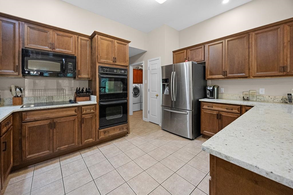 10135 WOODLAND HILLS DR