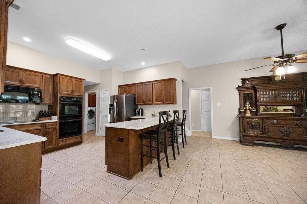 10135 WOODLAND HILLS DR