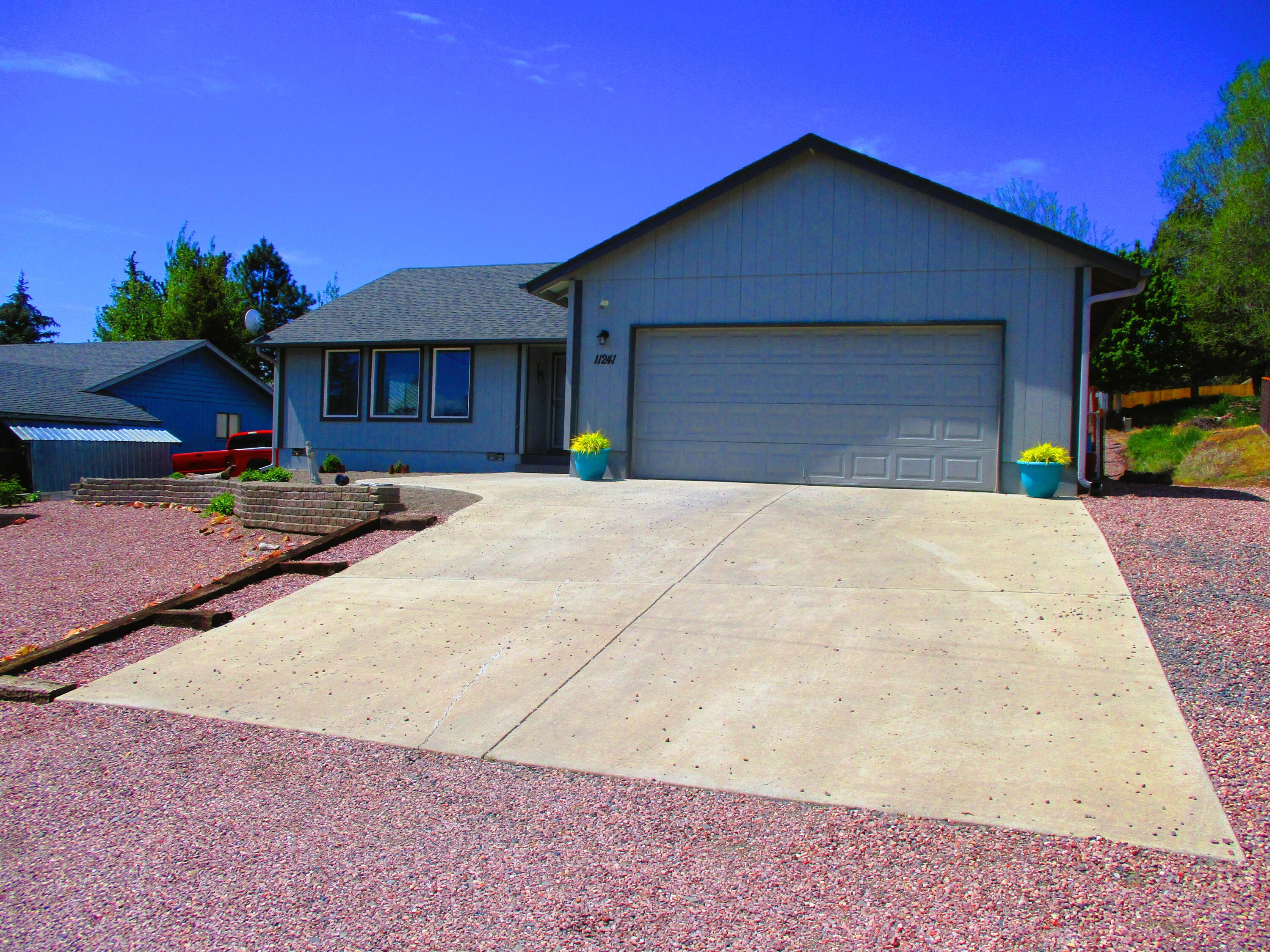 11241 NW Irvine Avenue