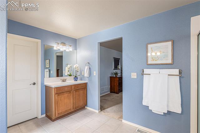 6077 Cumbre Vista Way