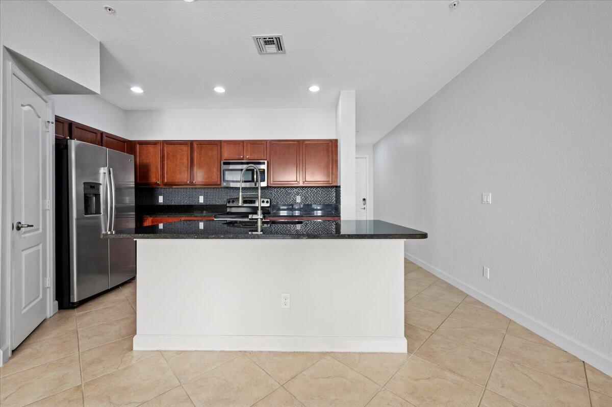 9472 SW Merlin Court