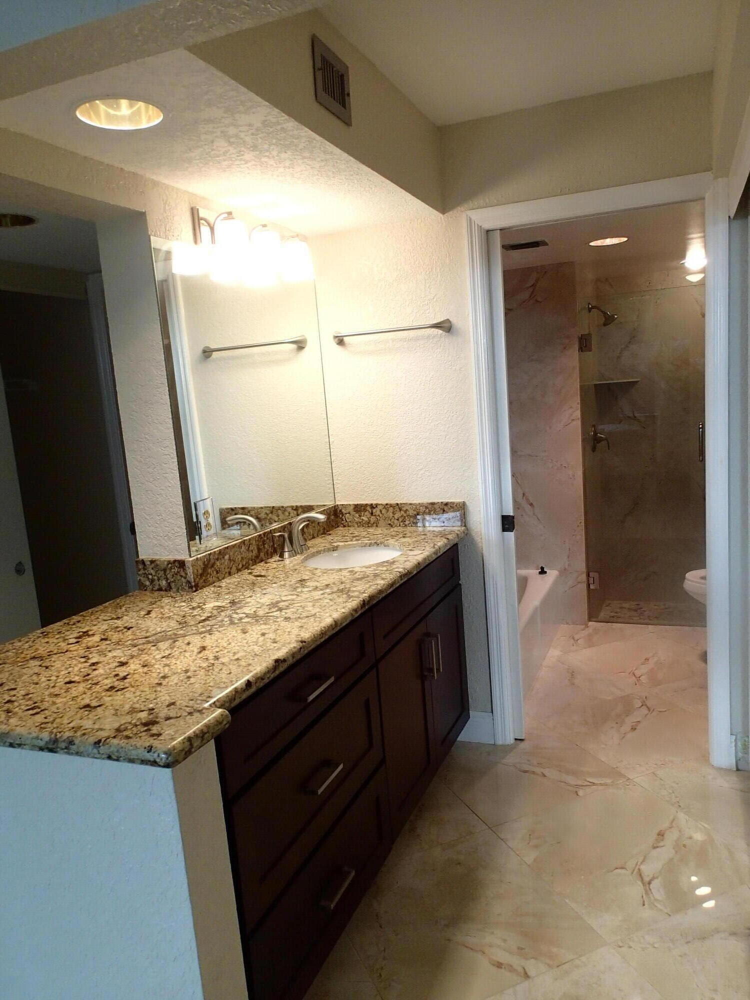 115 Bay Colony Drive N