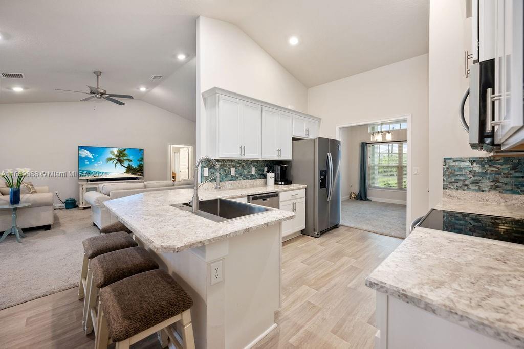6748 NW Mamie Court
