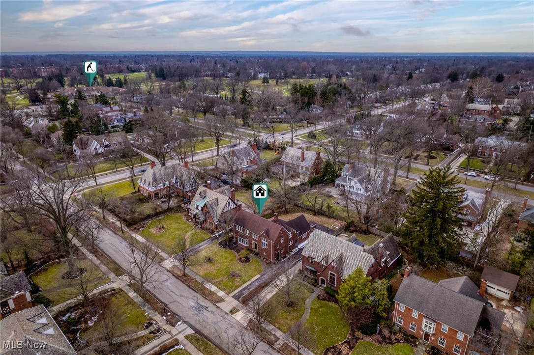 Aerial view of 3006 Kingsley Road amid brick homes and leafless trees.
