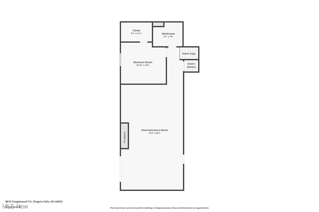 Floor plan with a long entertainment room and fireplace, plus a workout room, closet, bathroom, and stairs.