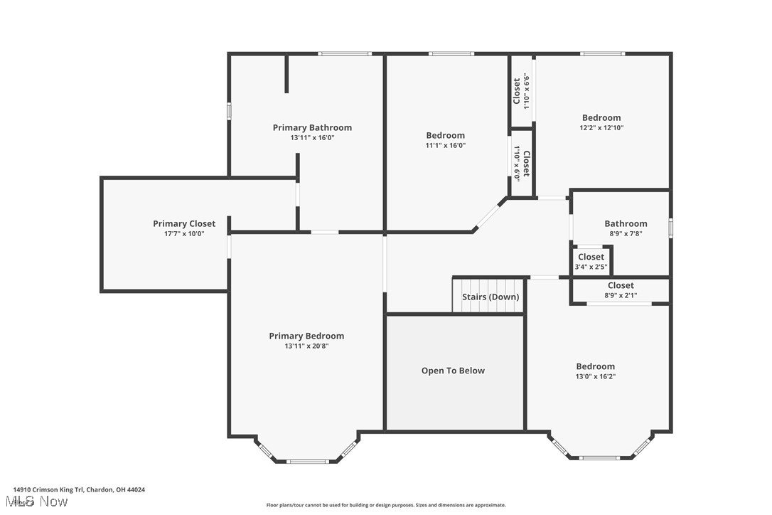 Second-floor plan with primary bedroom, three bedrooms, bathrooms, closets, stairs, and an open-to-below area.