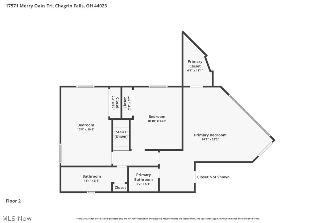 Second-floor plan with an angled primary bedroom, two additional bedrooms, bathrooms, closets, and stairs.