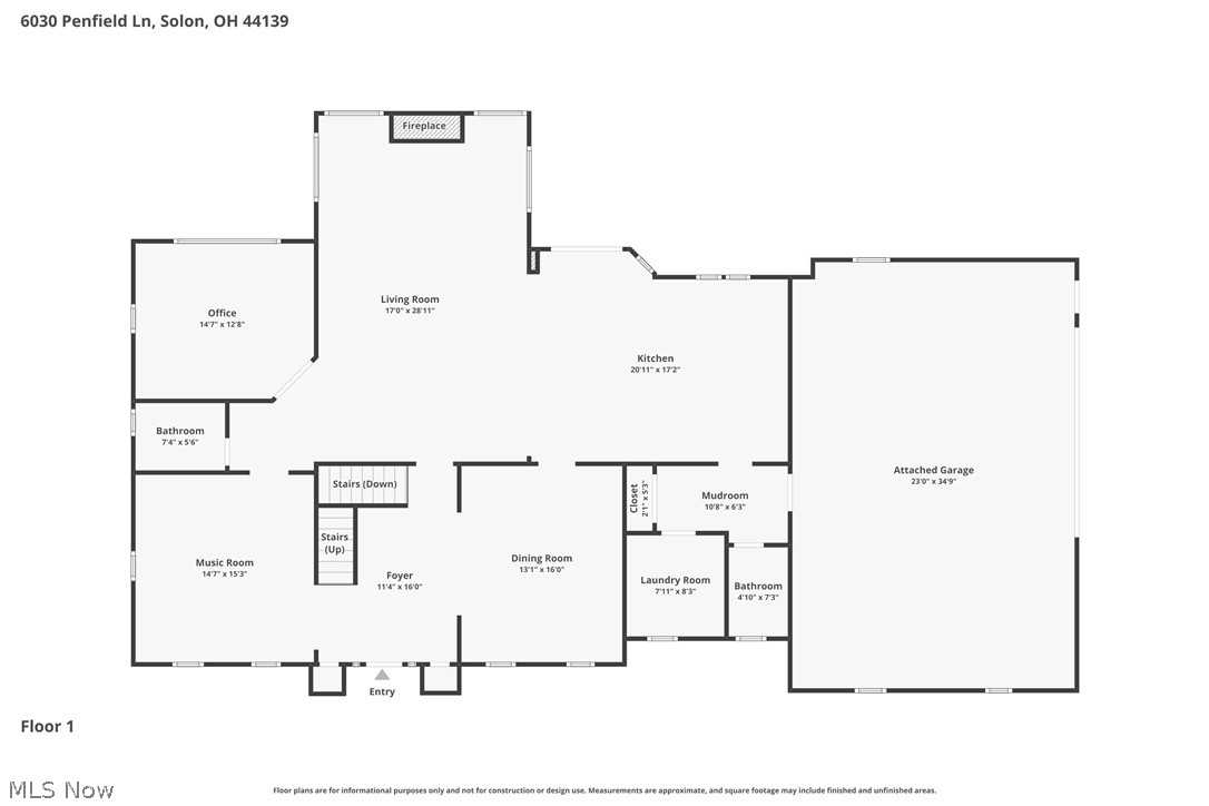 First-floor plan showing a fireplace, office, music room, kitchen, dining room, and attached garage.