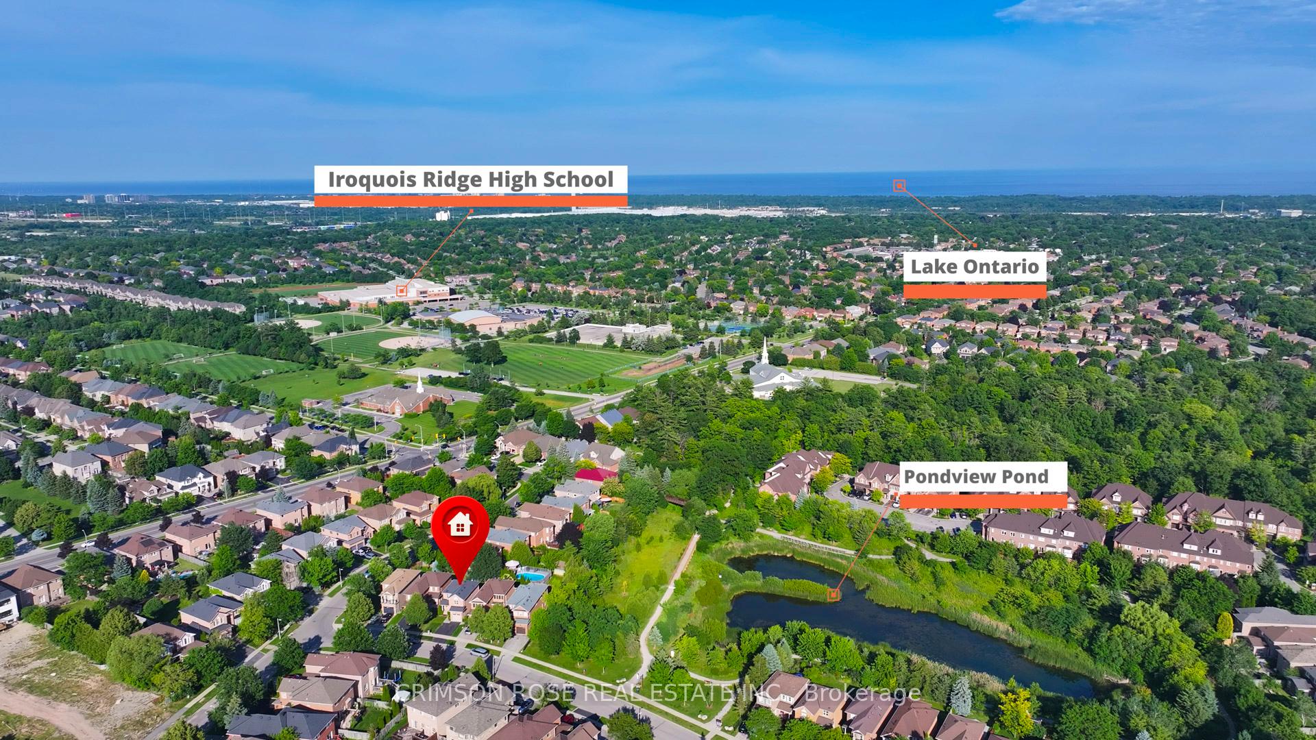 Aerial view of a leafy Oakville neighborhood, with Pondview Pond, Lake Ontario, and Iroquois Ridge High School labeled.