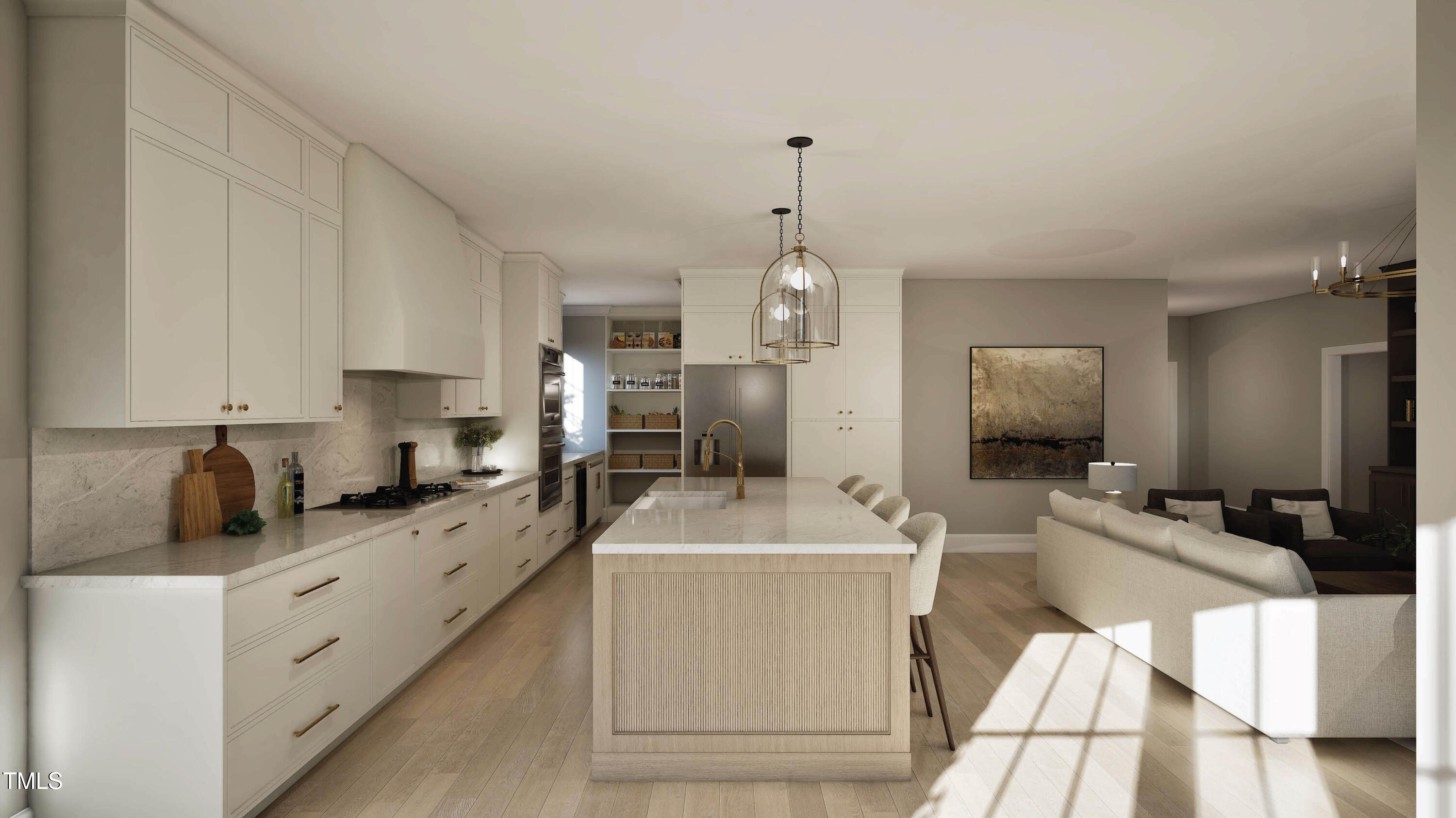 Open kitchen and living room with a large island, white cabinetry, and sunlight on the wood floor.