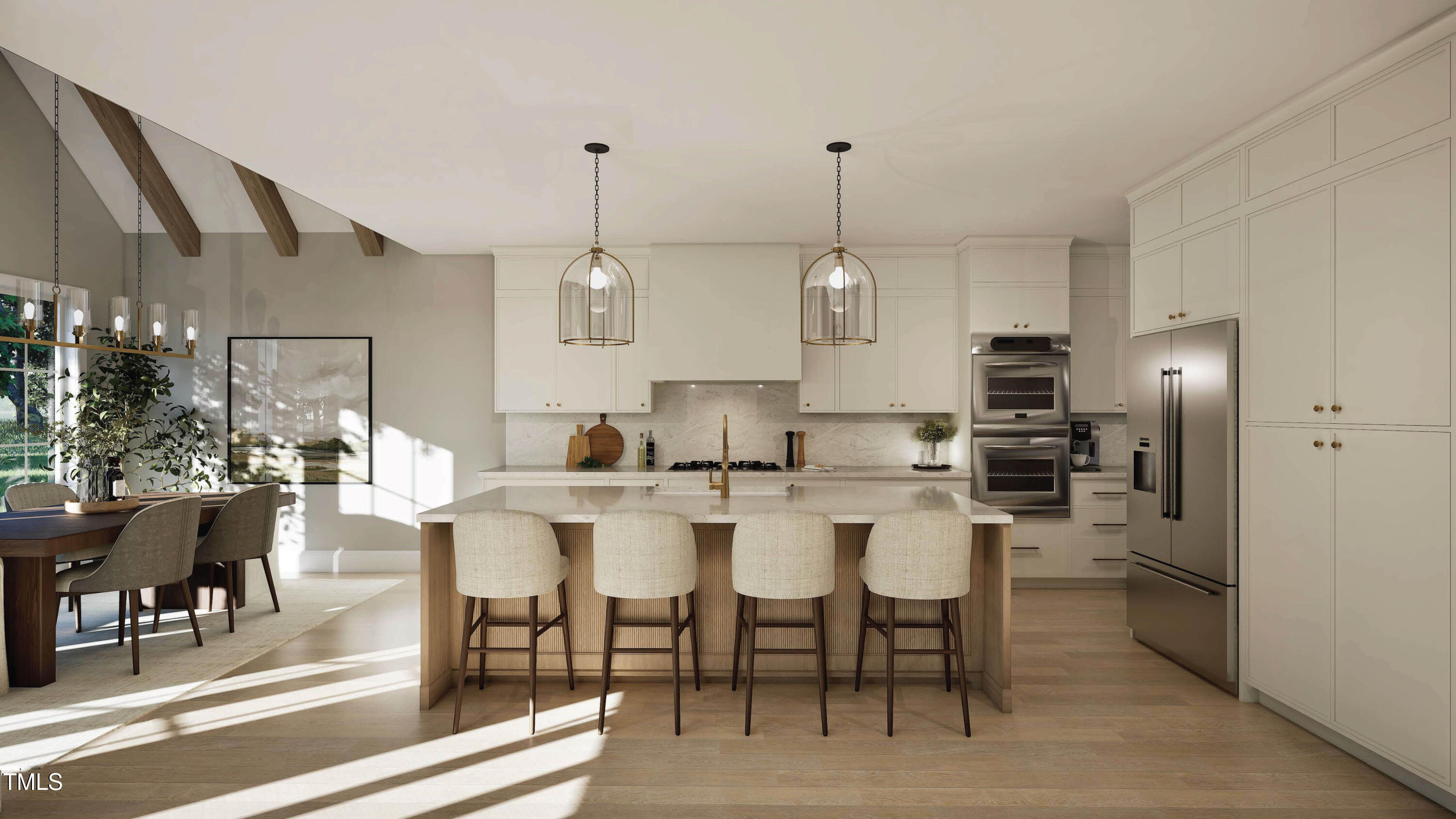 Bright kitchen with a large island, four bar stools, white cabinetry, and a dining area by tall windows.