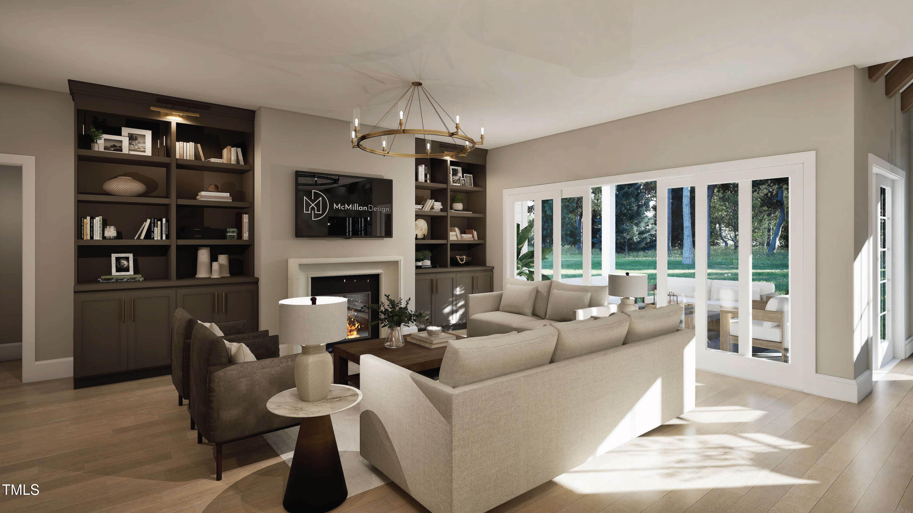 Living room with built-in bookshelves, fireplace, neutral sofas, and wide windows overlooking trees.