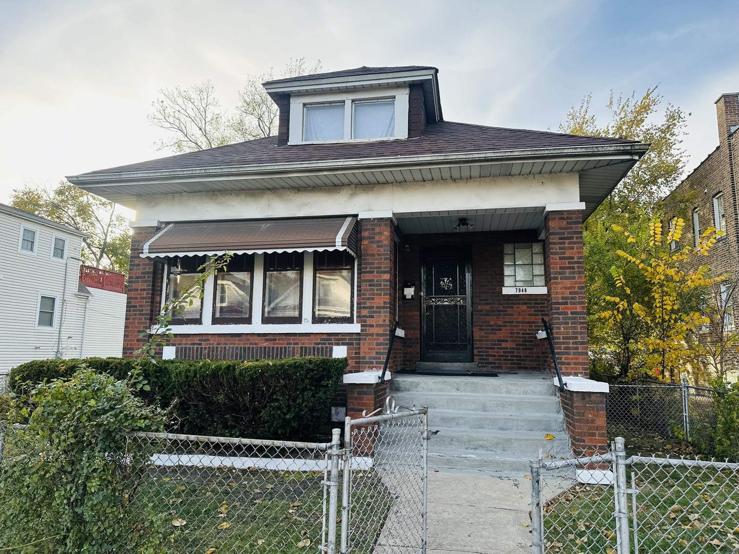 7948 S COLFAX Avenue