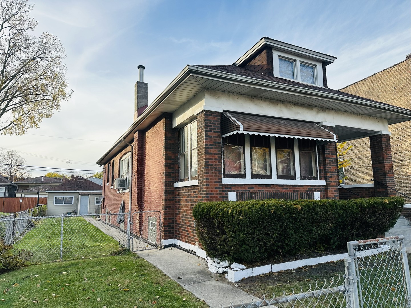 7948 S COLFAX Avenue