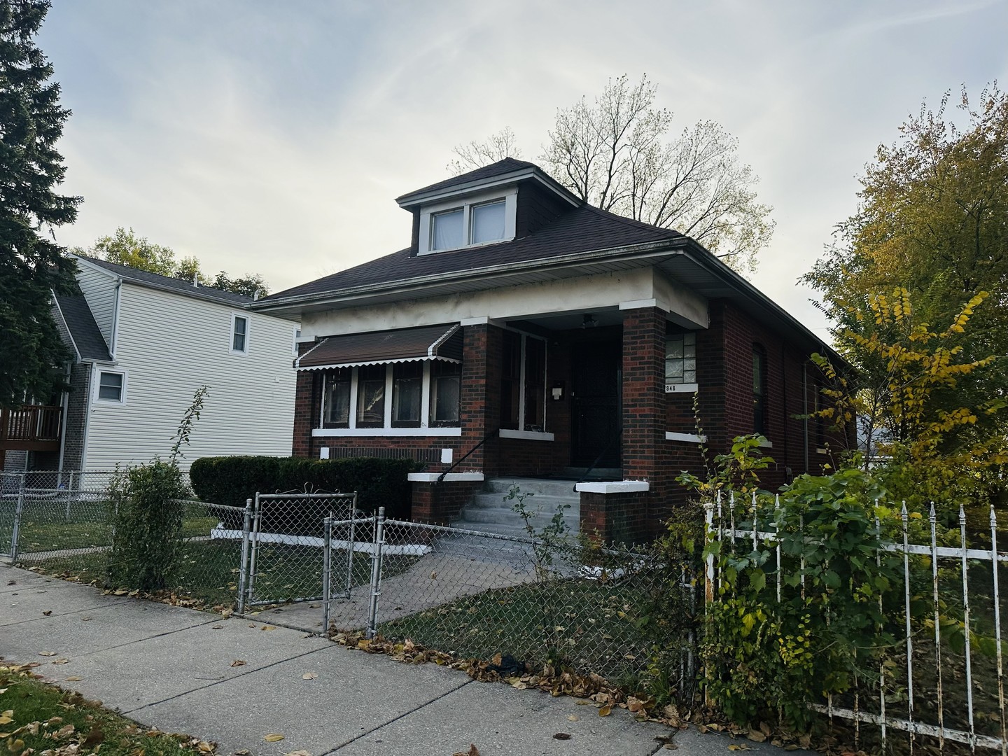 7948 S COLFAX Avenue