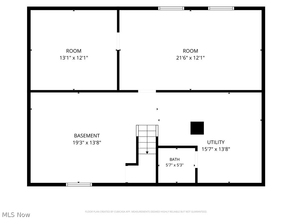 Basement floor plan with two rooms, utility room, bathroom, and staircase.
