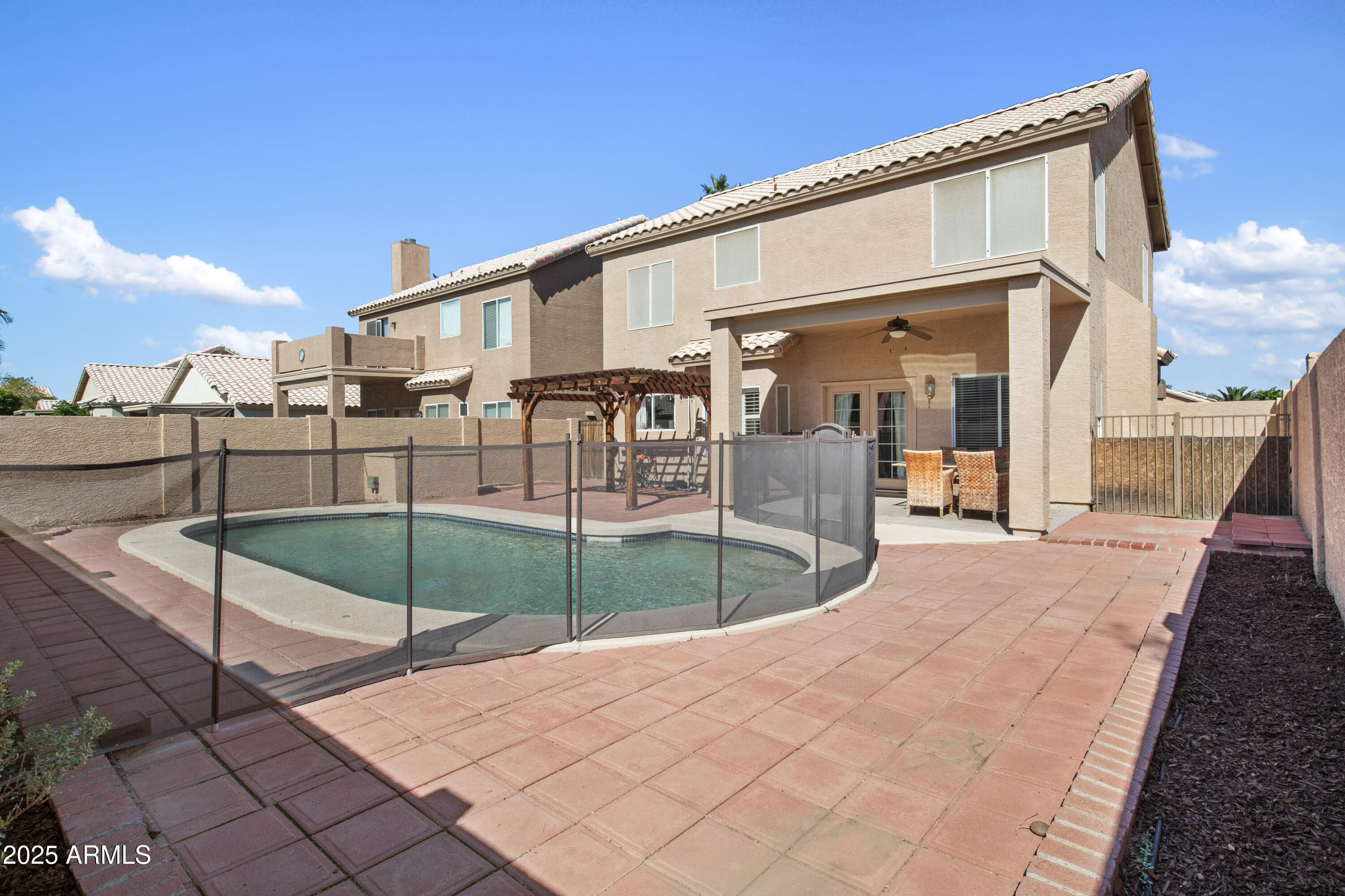 7405 W EMILE ZOLA Avenue