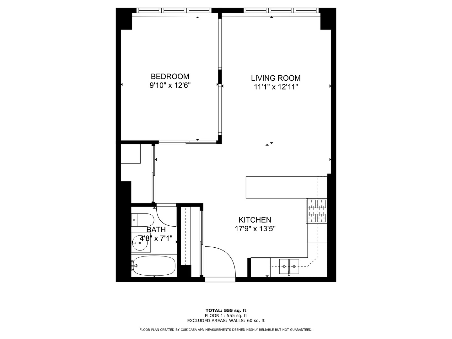 Floor plan of a 555-square-foot condo with one bedroom, living room, kitchen, and bathroom.