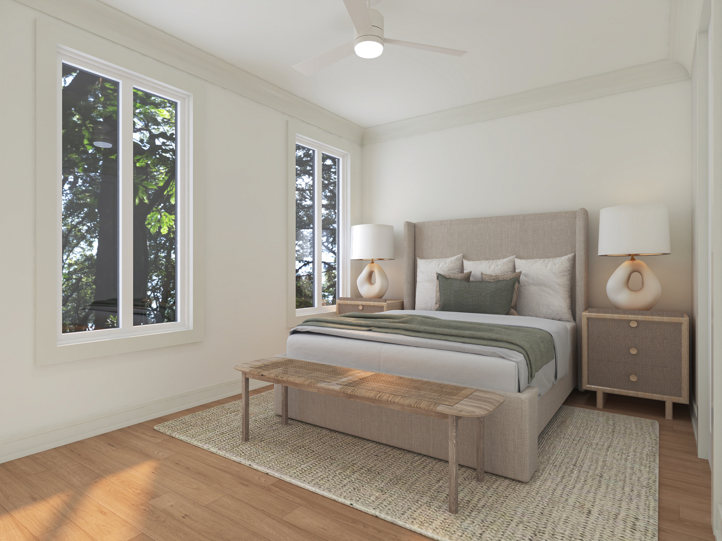 Furnished bedroom with an upholstered bed, woven bench, and tall windows overlooking leafy trees.