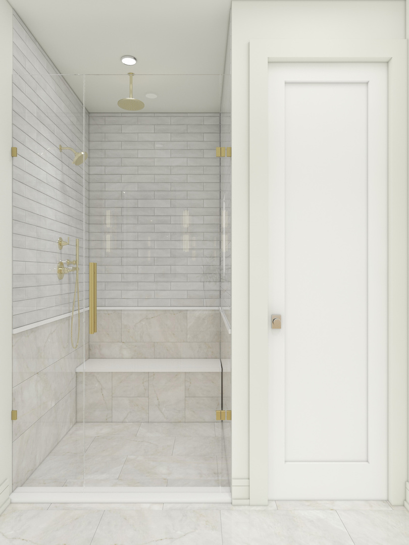 Walk-in shower with a built-in tiled bench, glass enclosure, and brass fixtures.