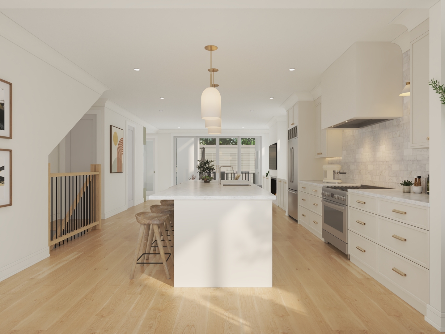 Open kitchen with a large marble island, white cabinets, and sliding glass doors.