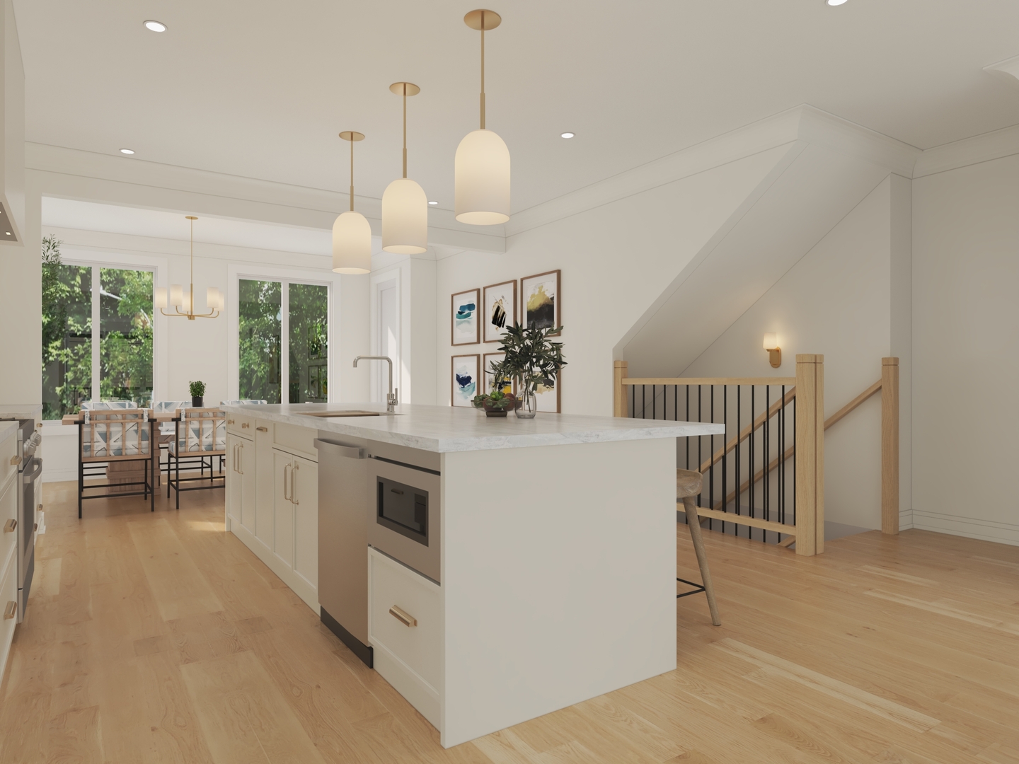 Kitchen with a large white island, pendant lights, dining area, and staircase.
