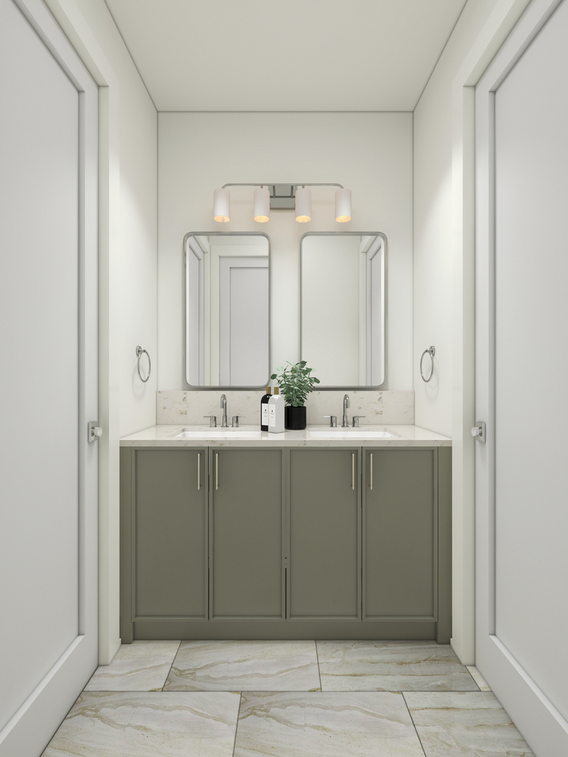Bathroom double vanity with sage-gray cabinets, paired mirrors, and veined stone tile flooring.